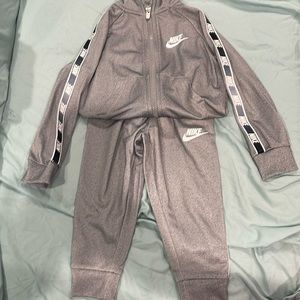 Light grey track suit